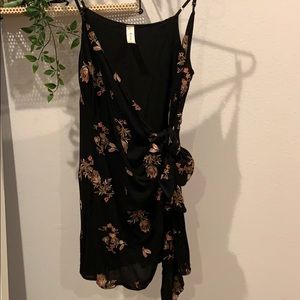 black wrap dress with floral stitching